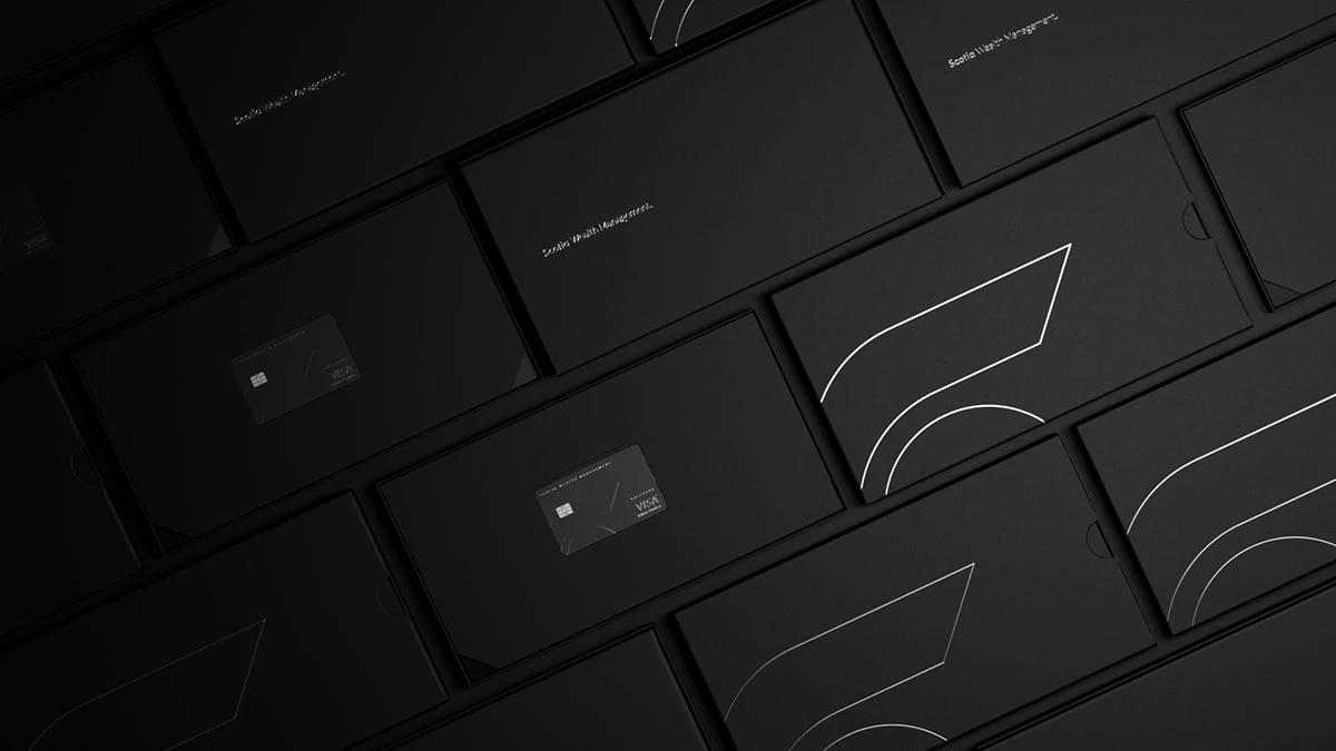 Young happy woman doing shopping online with her laptop at home. Portrait of excited woman holding credit card and buy on an e-commerce site with copy space. Beautiful laughing girl paying online bills using debit card and computer.